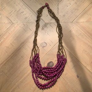 Multi strand purple and gold Noonday Necklace